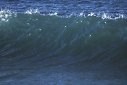 blue ocean water wave cresting